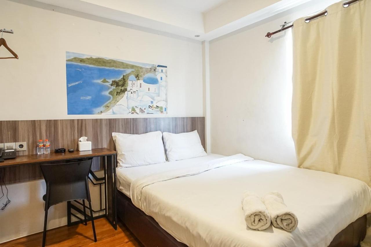 Hotel Sanrina Makassar Bagian luar foto